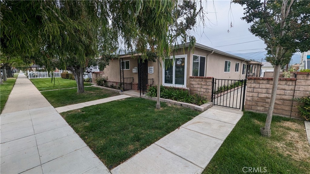 front view of a house with a yard