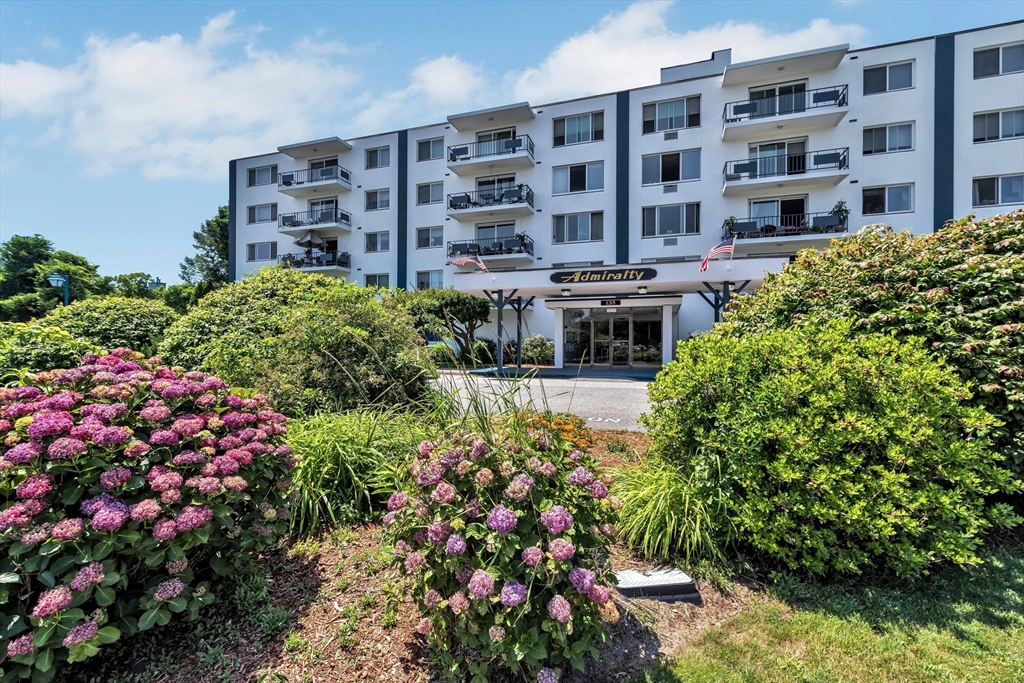 a building view with a garden space