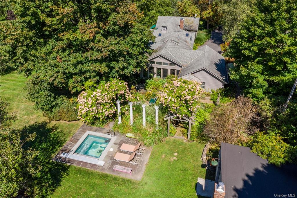 an aerial view of residential house with outdoor space