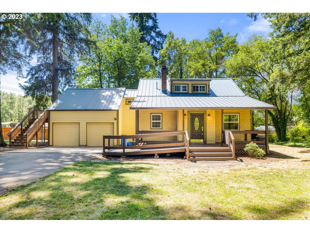 a front view of house with an outdoor seating