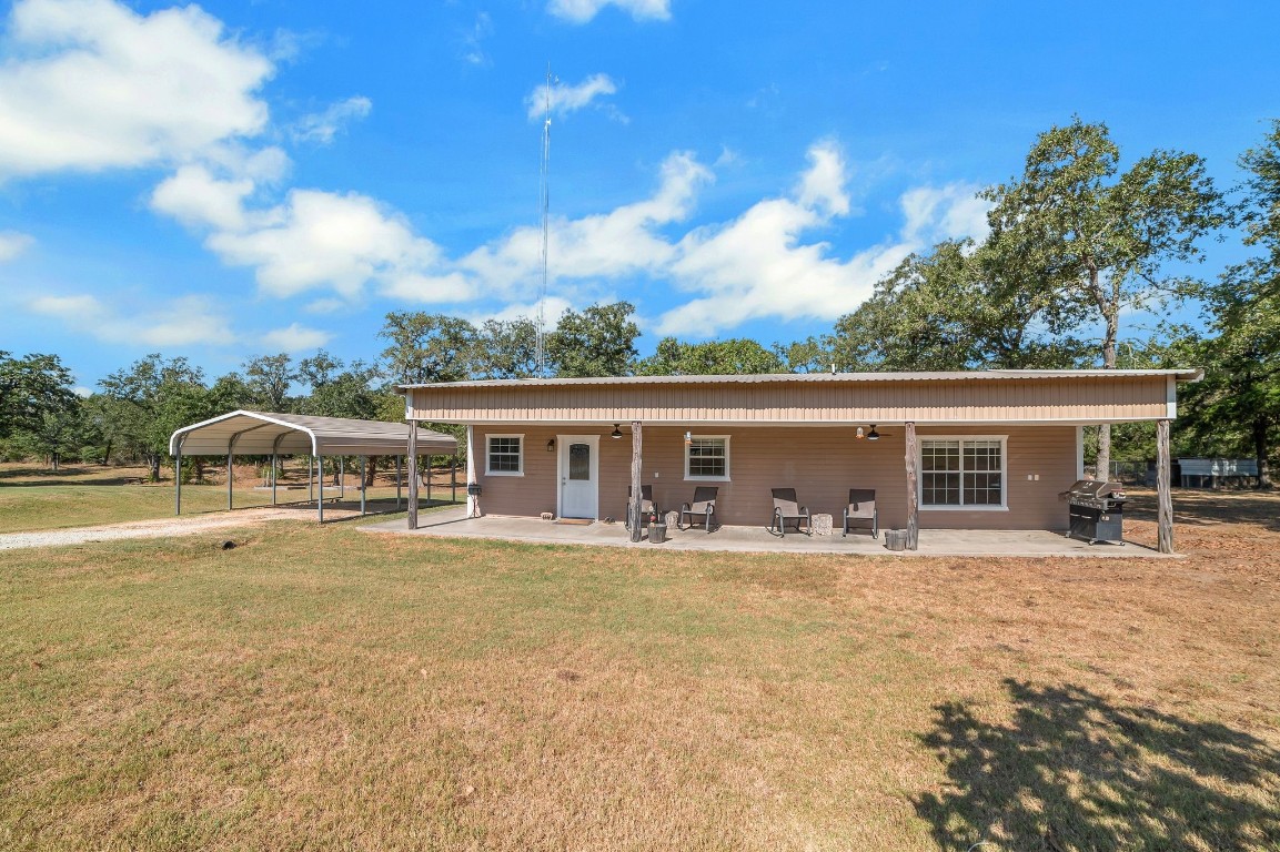 front view of a house with a patio