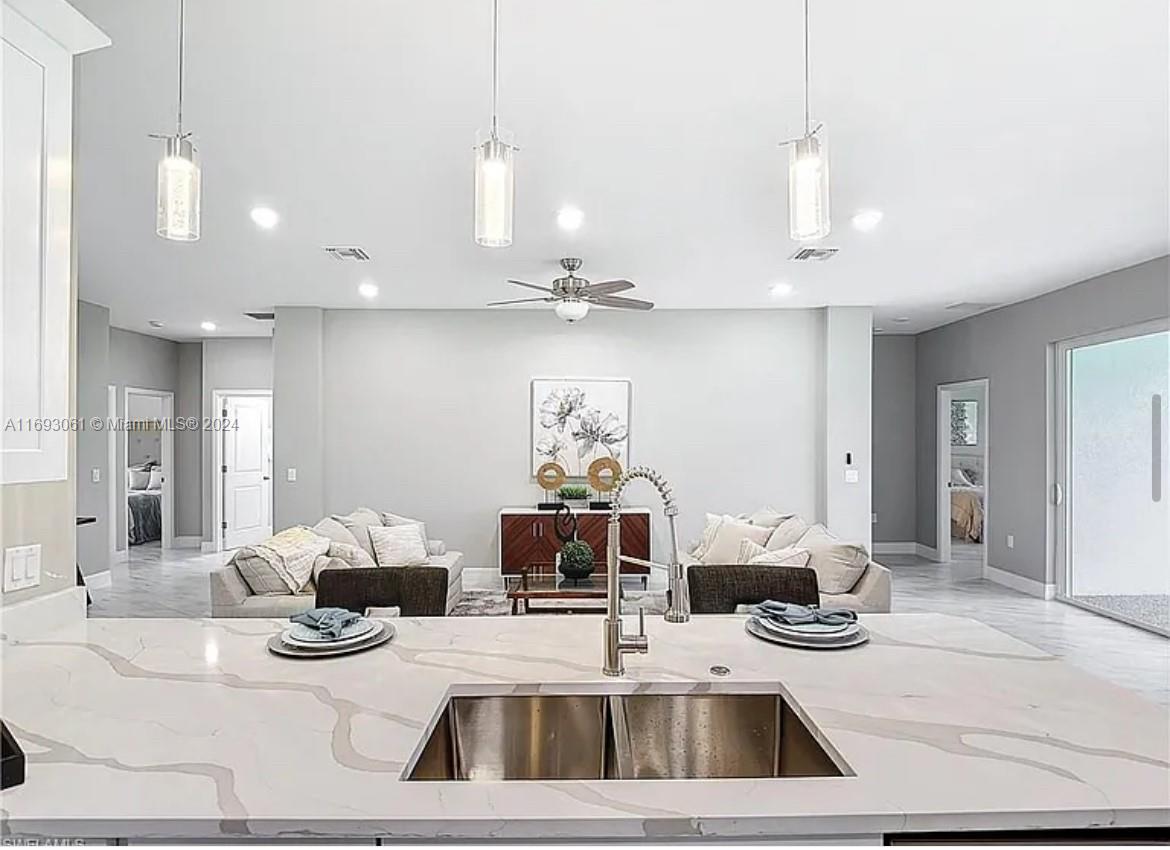 a very nice looking dining room with a table and chairs