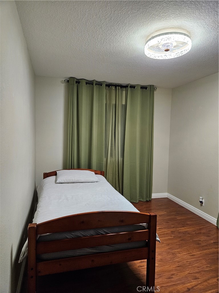 a room with a table and chandelier