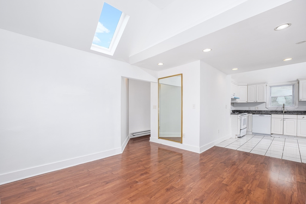 a view of kitchen with wooden floor