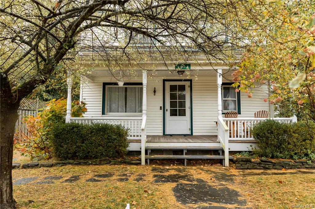 View of front of property with a porch