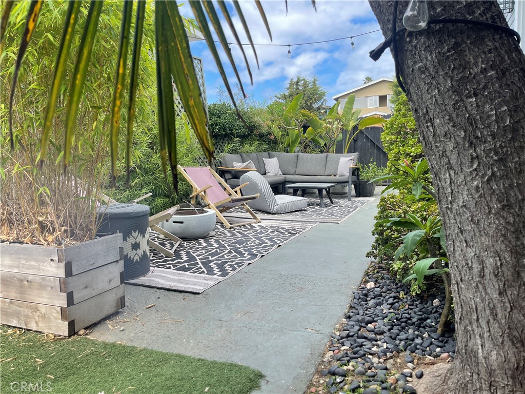 a view of garden with patio