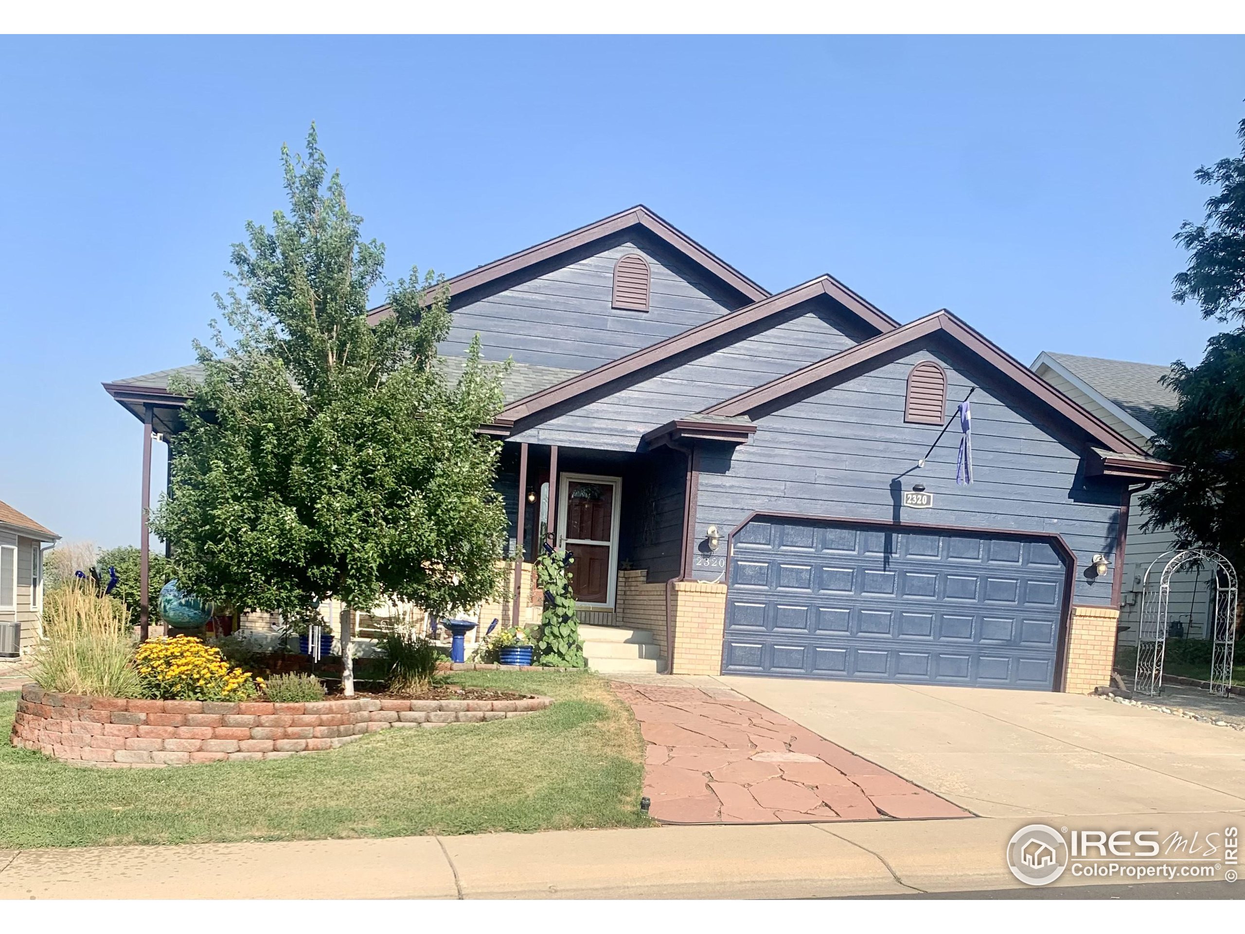 a view front of house with garage