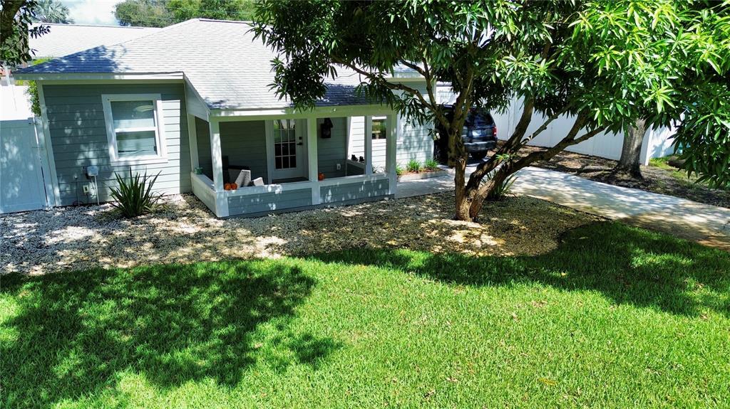 a view of a house with a yard