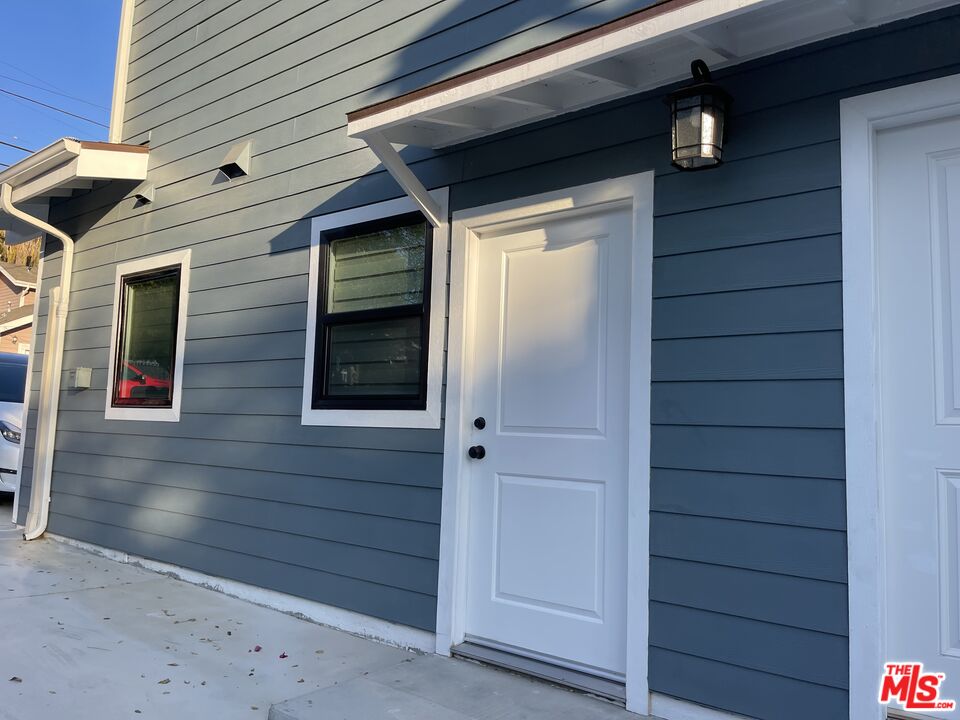 a view of front door and porch