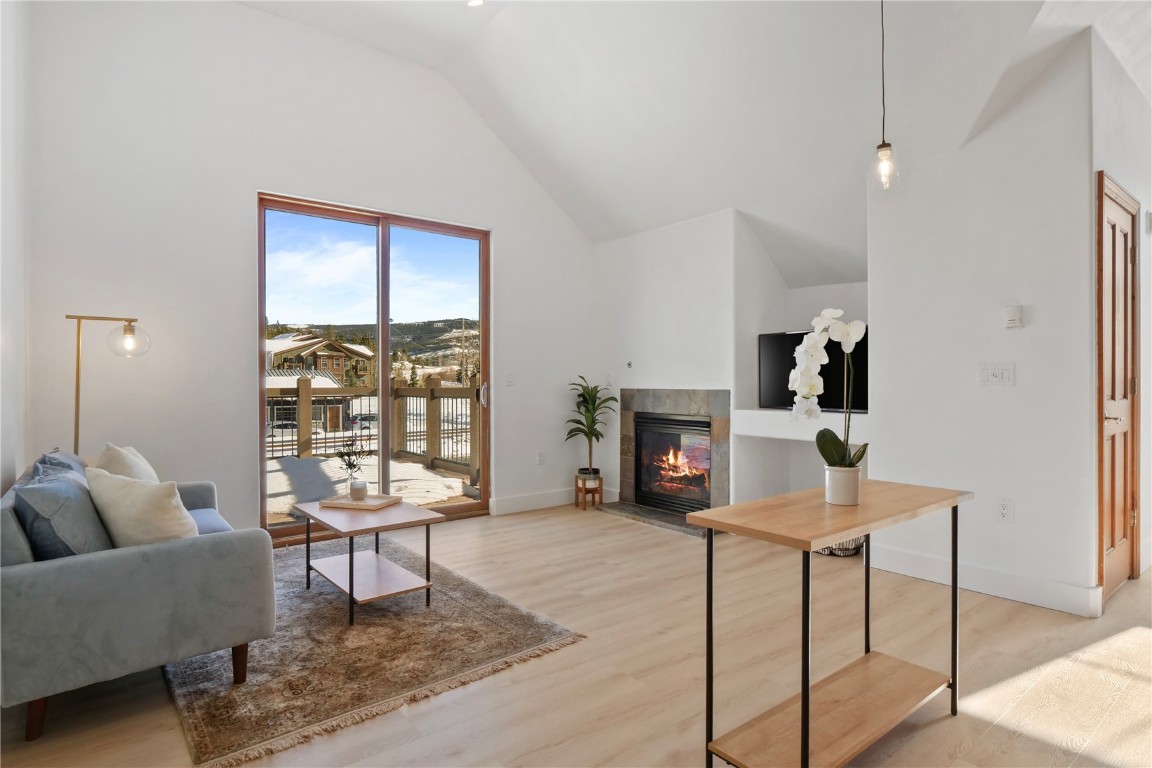 Bright and open living space with gas fireplace