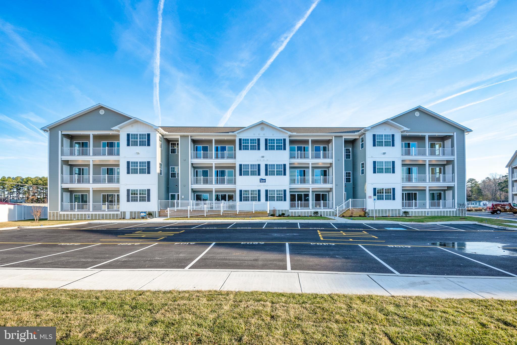 a front view of a building with street view