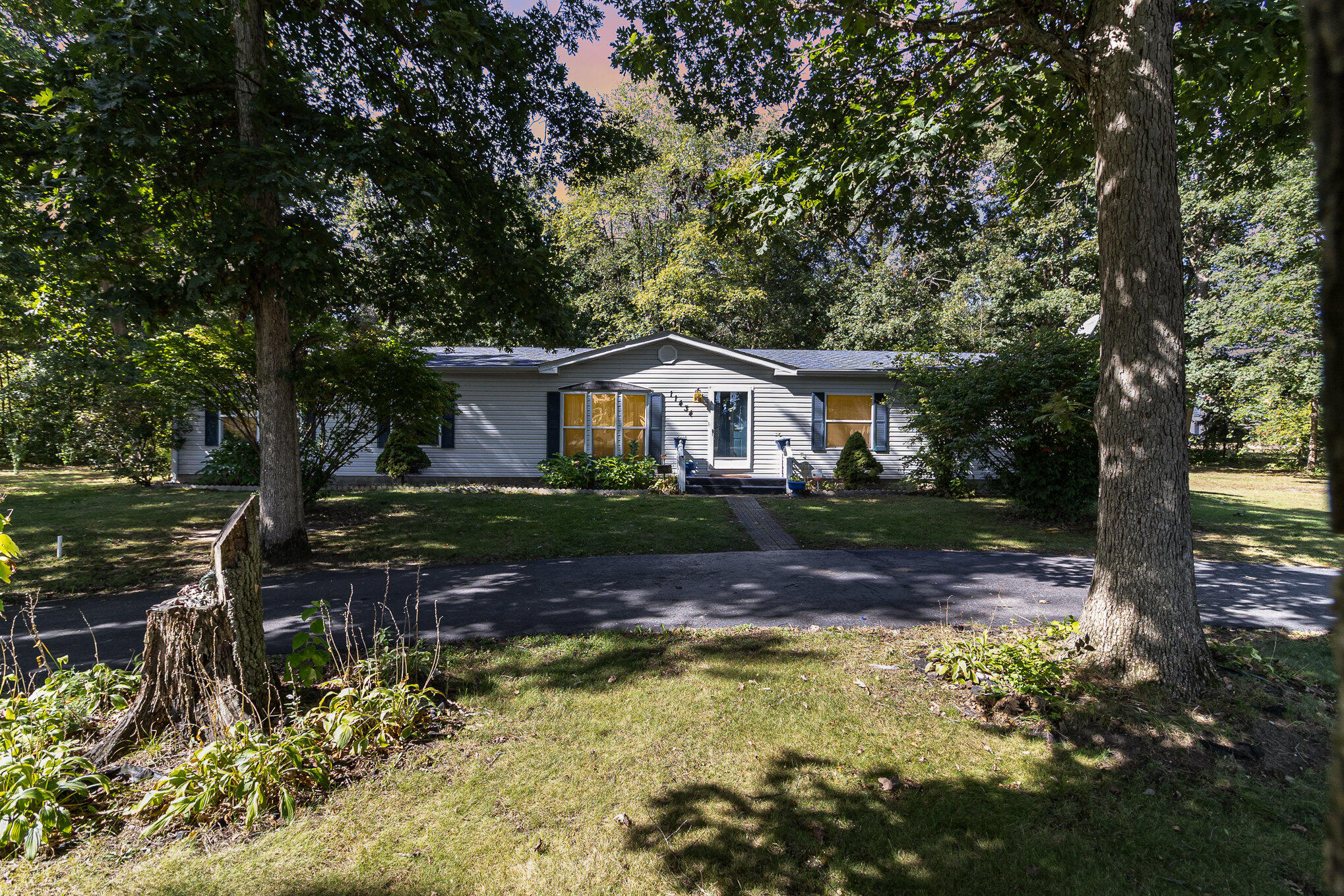 a view of house outdoor space and yard