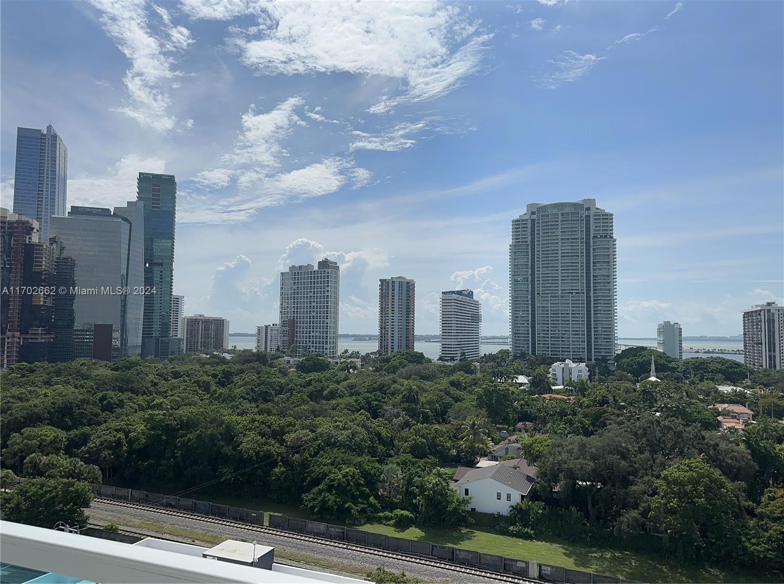 a view of a city with tall buildings