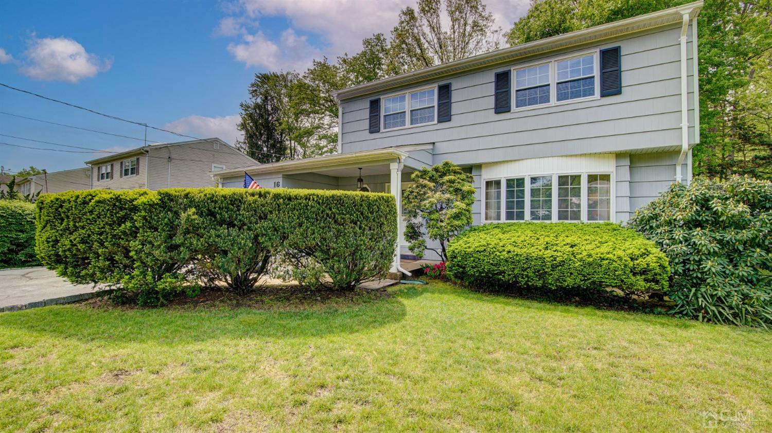 a view of a house with a garden