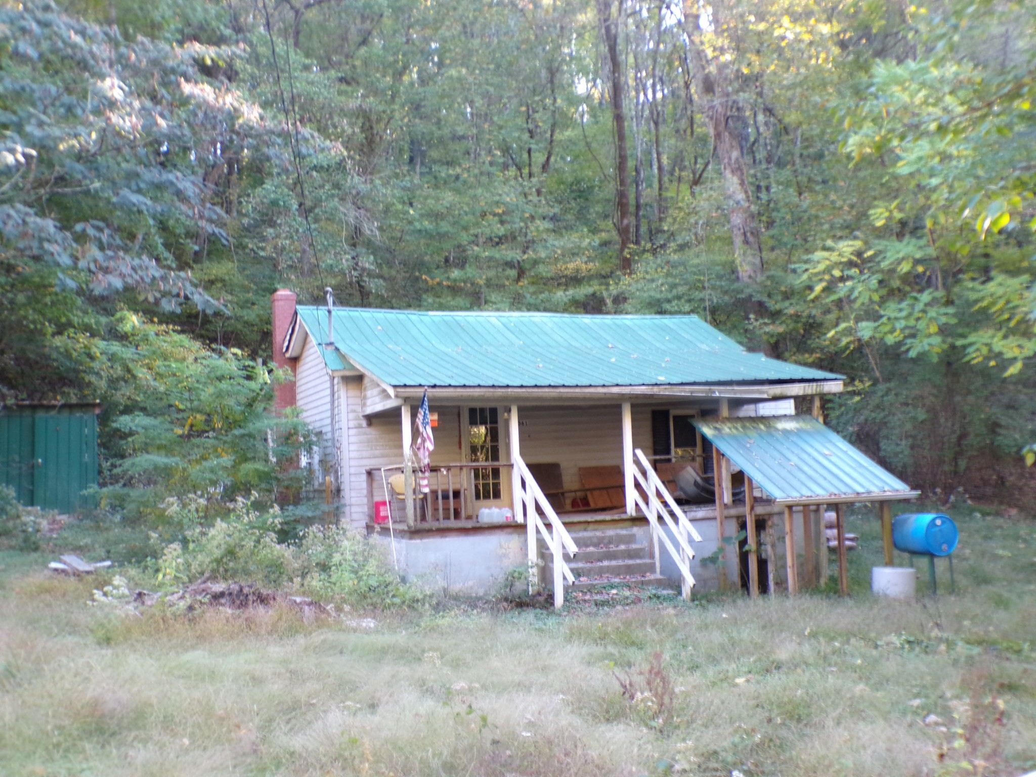 an outdoor view of house with yard