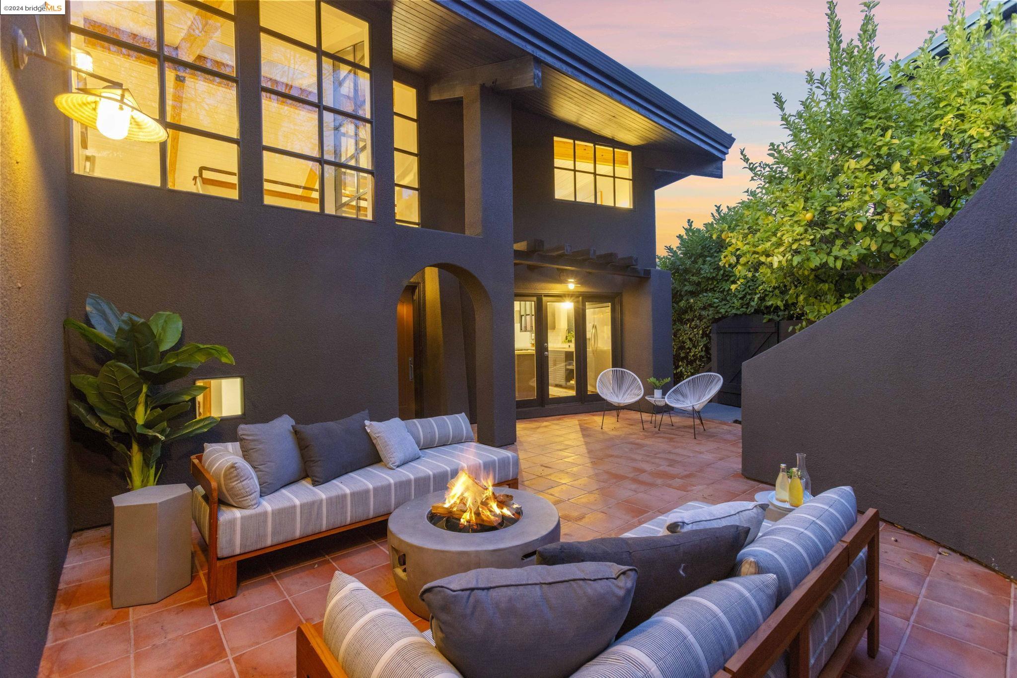 a outdoor living space with furniture and garden view