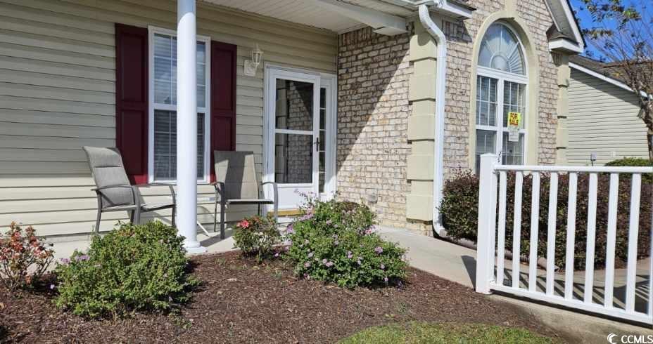 Entrance to property with a porch