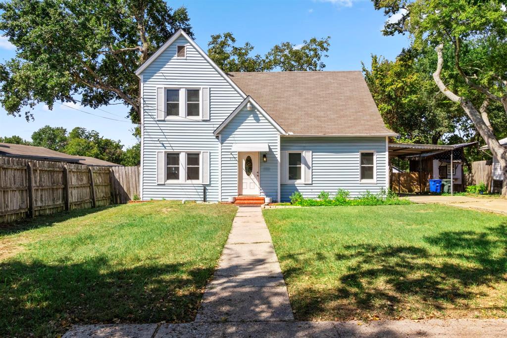 front view of a house and a yard