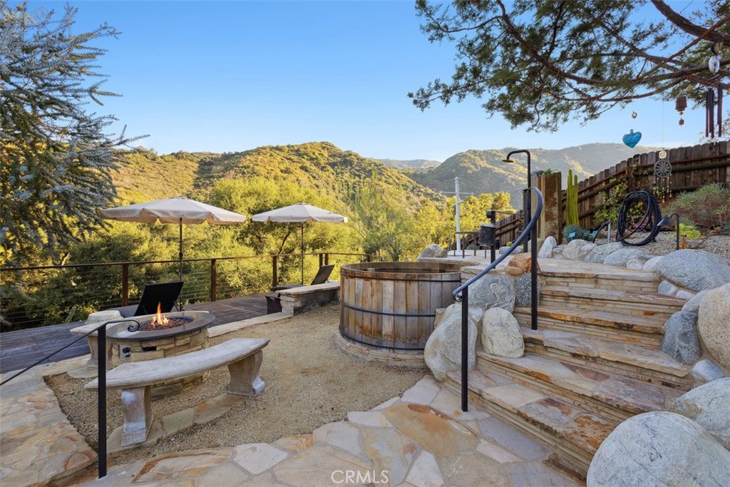 a view of a chairs and tables in the patio