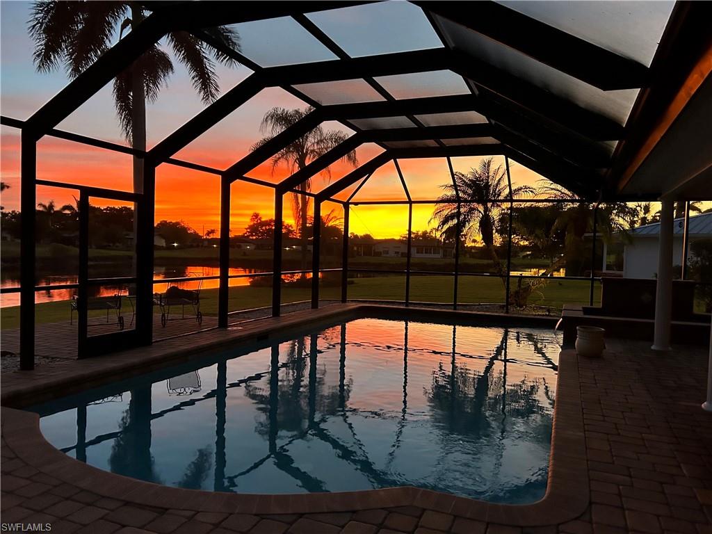 a view of swimming pool from a balcony