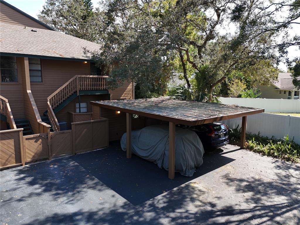 a view of backyard with outdoor seating