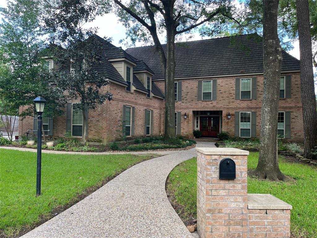 Looking like an English Manor, this beautiful home is only one of two built on this plan.The home includes a a 60-year lightweight concrete roof that looks like slate, Trane air conditioners installed in 2019, and PEX plumbing installed in 2021.