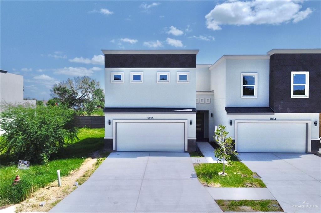 a front view of house with yard