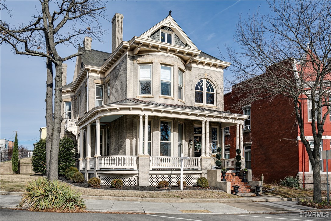 View of front of property featuring a porch