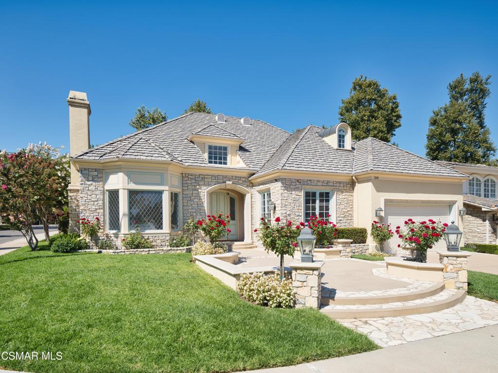 a front view of a house with dining space