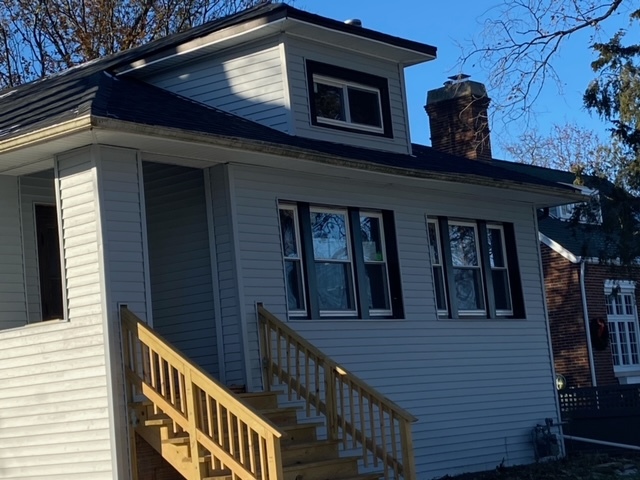 a view of a house with a deck