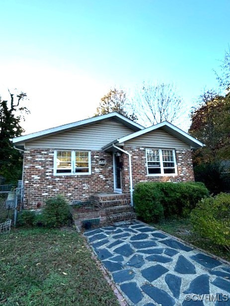 a front view of a house with yard