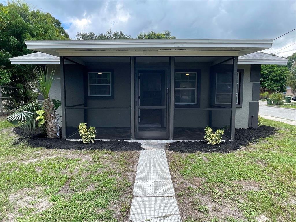 a front view of house with yard