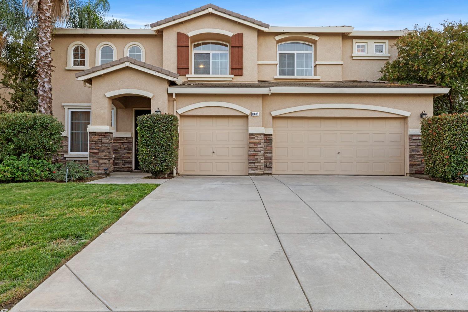 front view of house with a yard