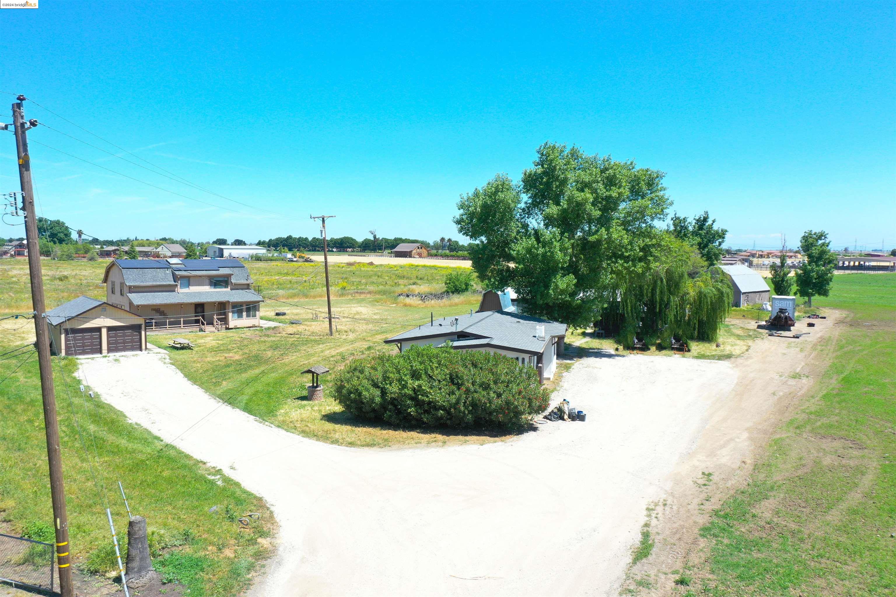 a view of a swimming pool with a yard