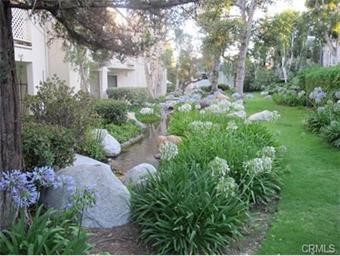 a view of a garden with pathway