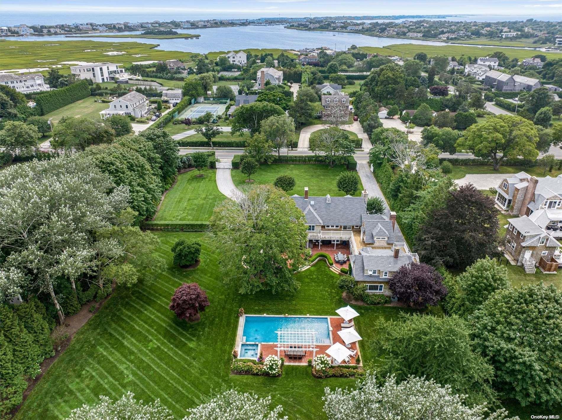 an aerial view of a house with a garden