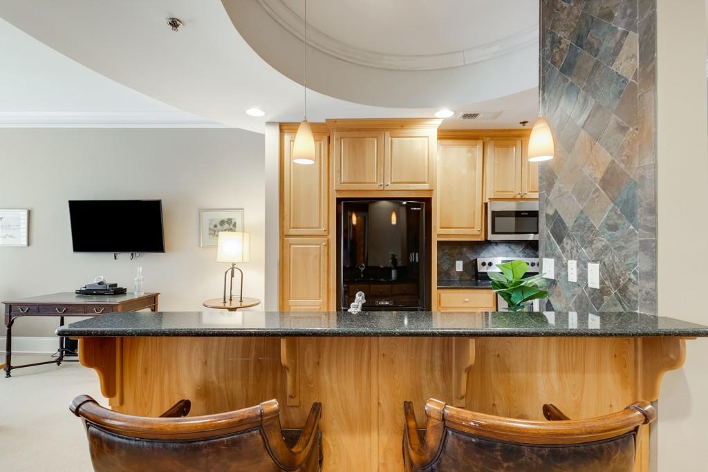 a view of a living room and dining room