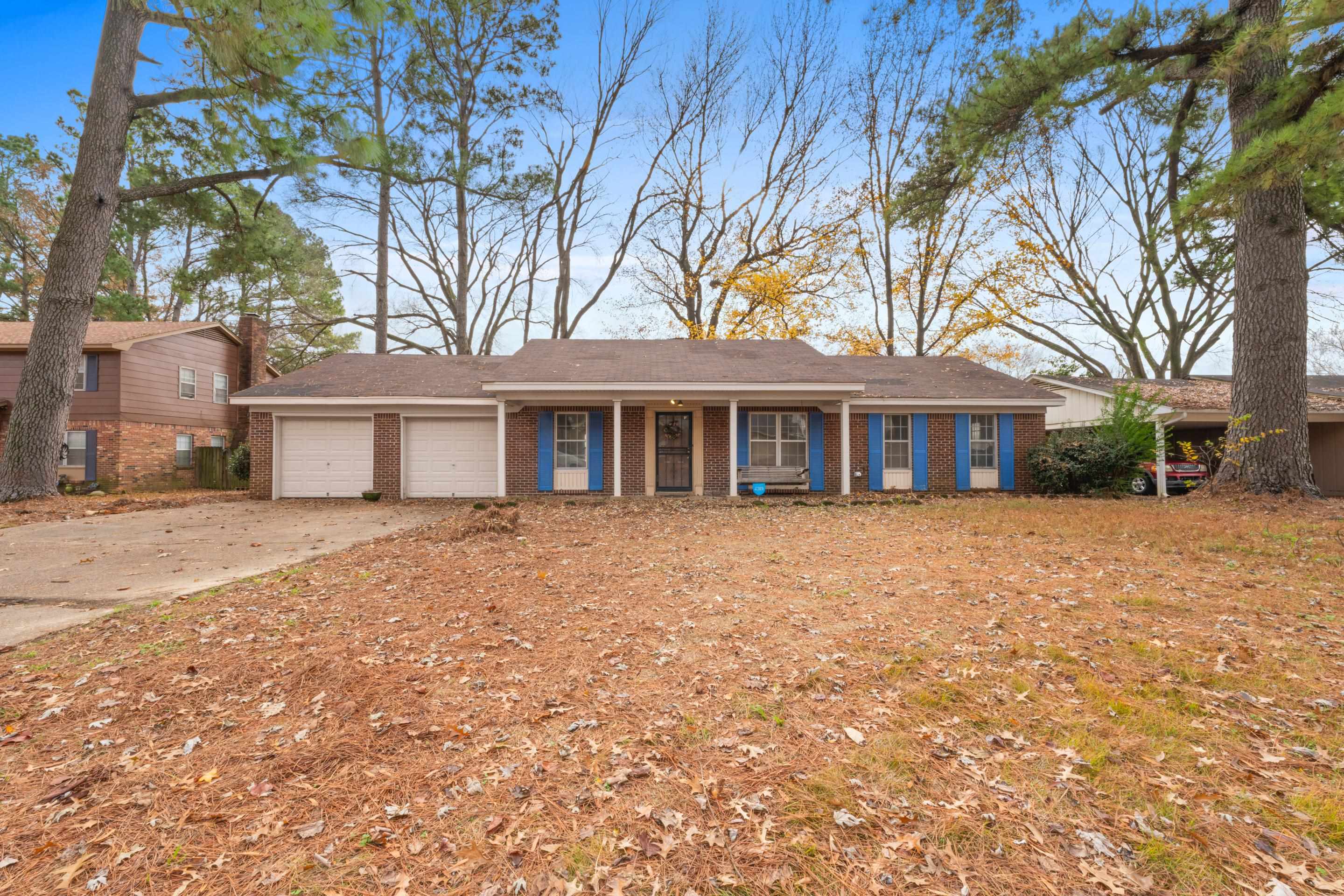 Ranch-style house with a garage