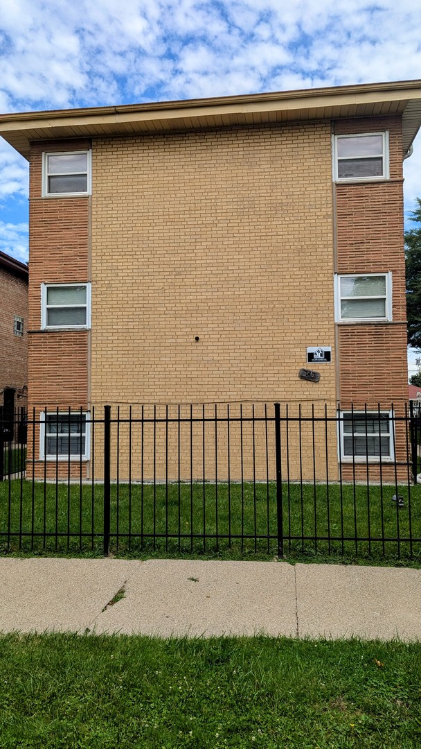 a view of backyard with green space