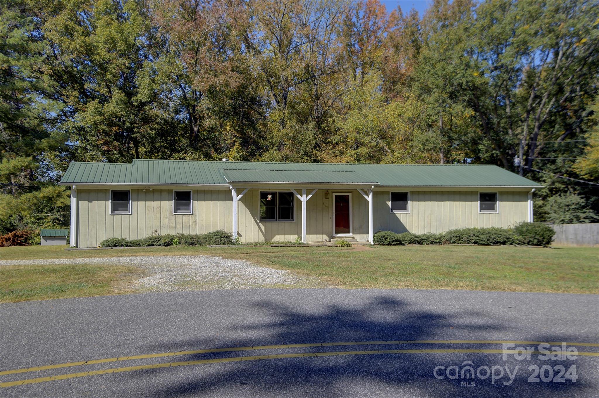 front view of a house with a yard