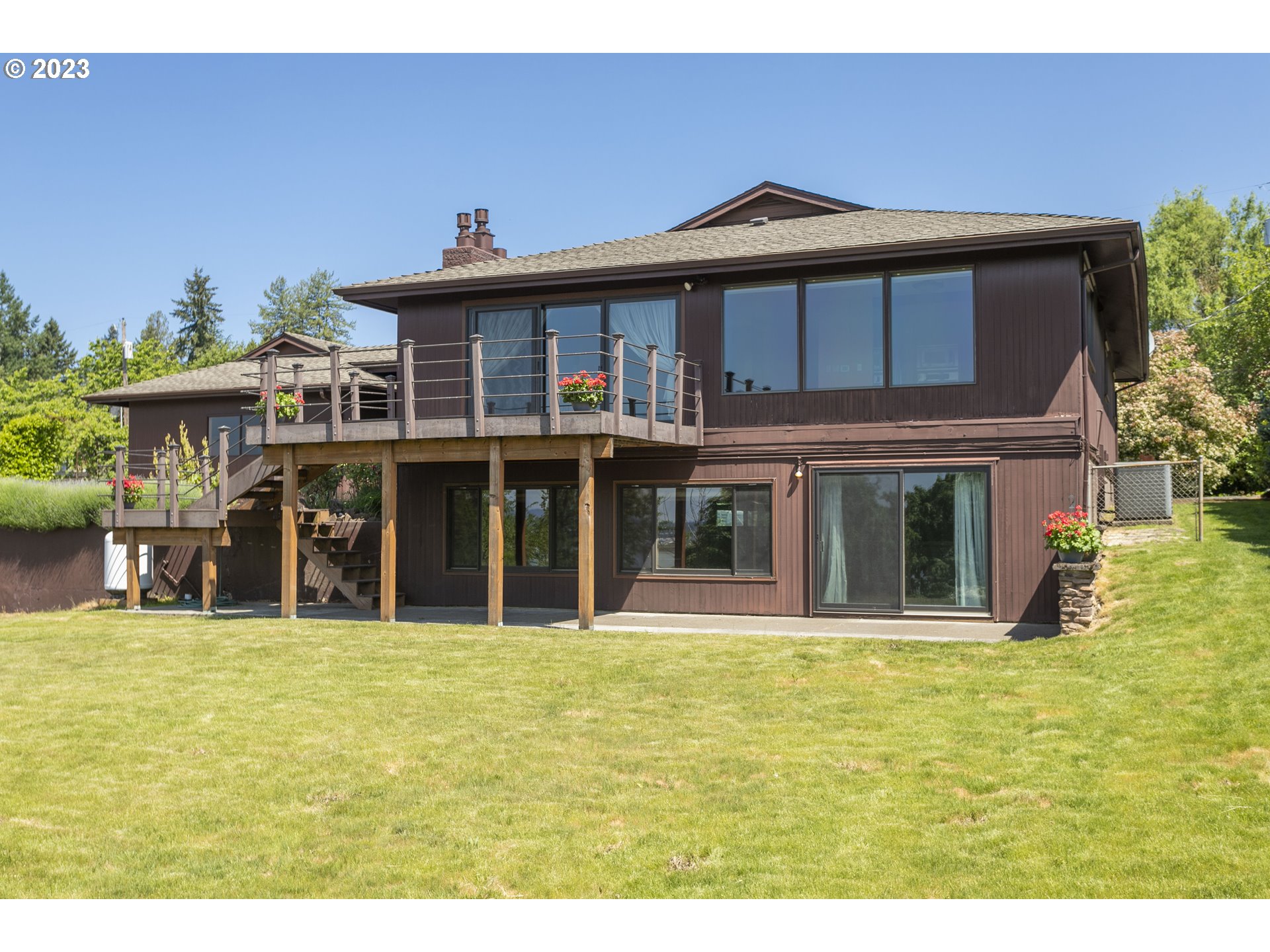 a view of a house with a swimming pool