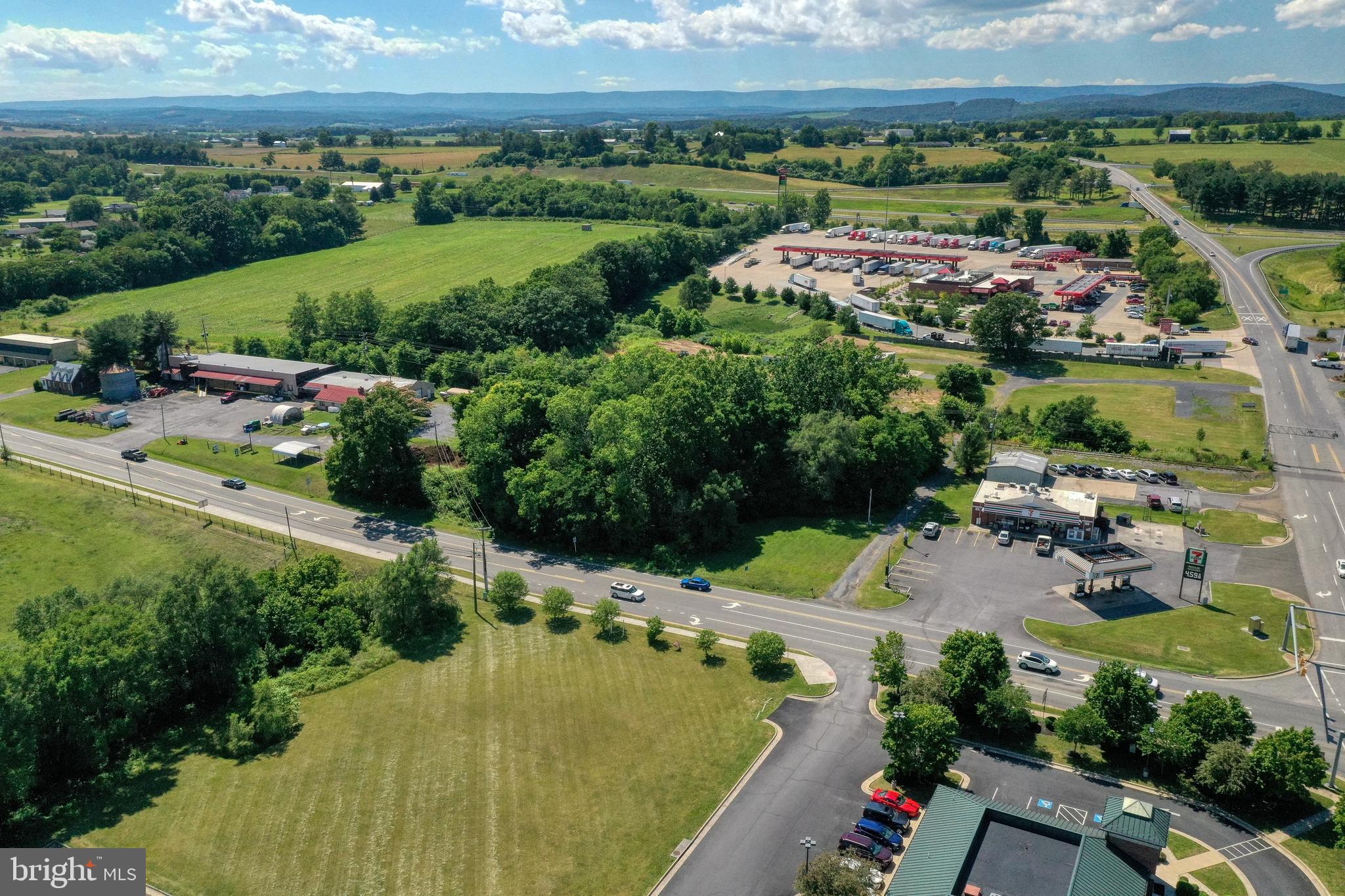 an aerial view of residential houses and outdoor space