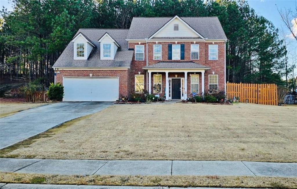 front view of house with a yard