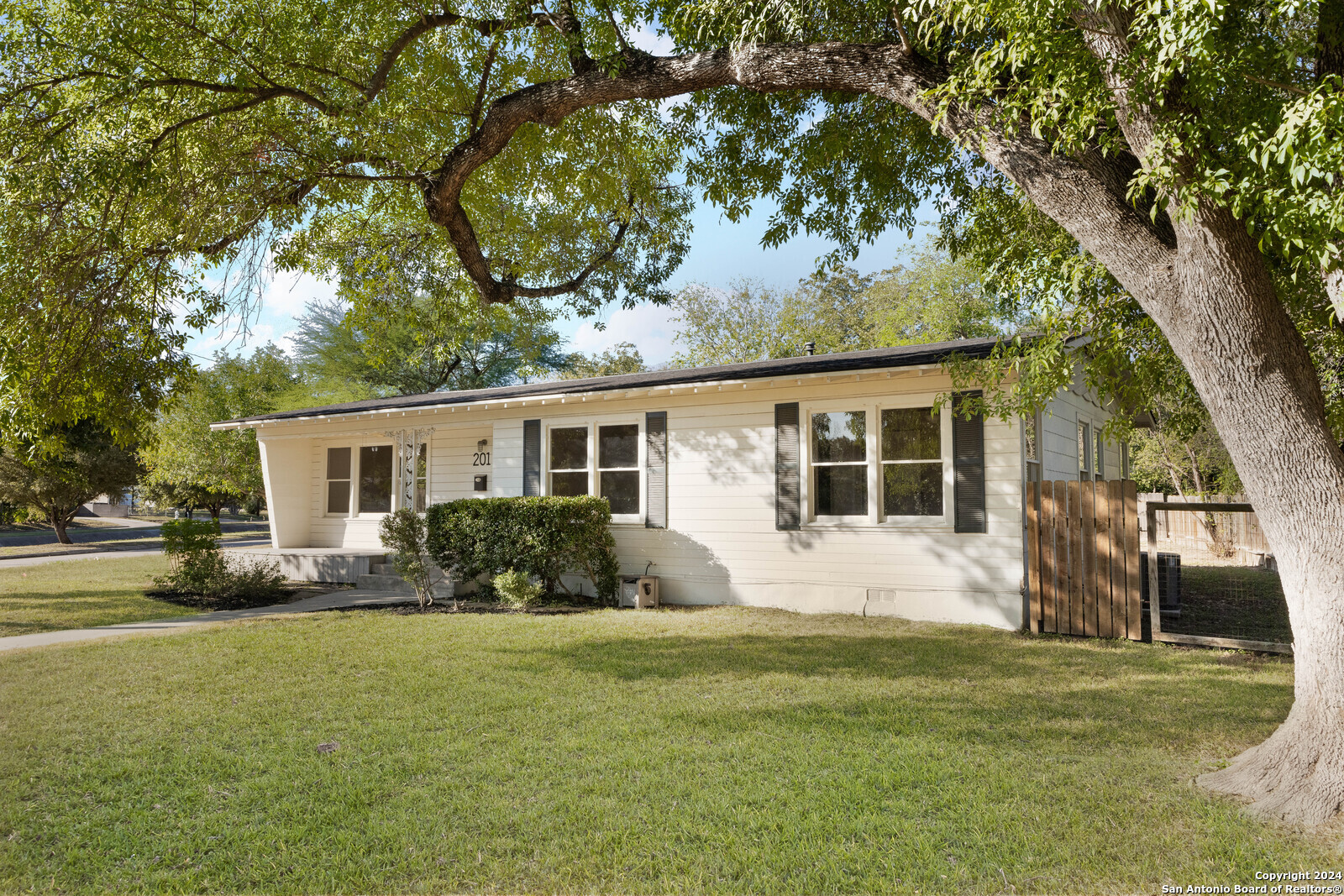 a house view with a garden space