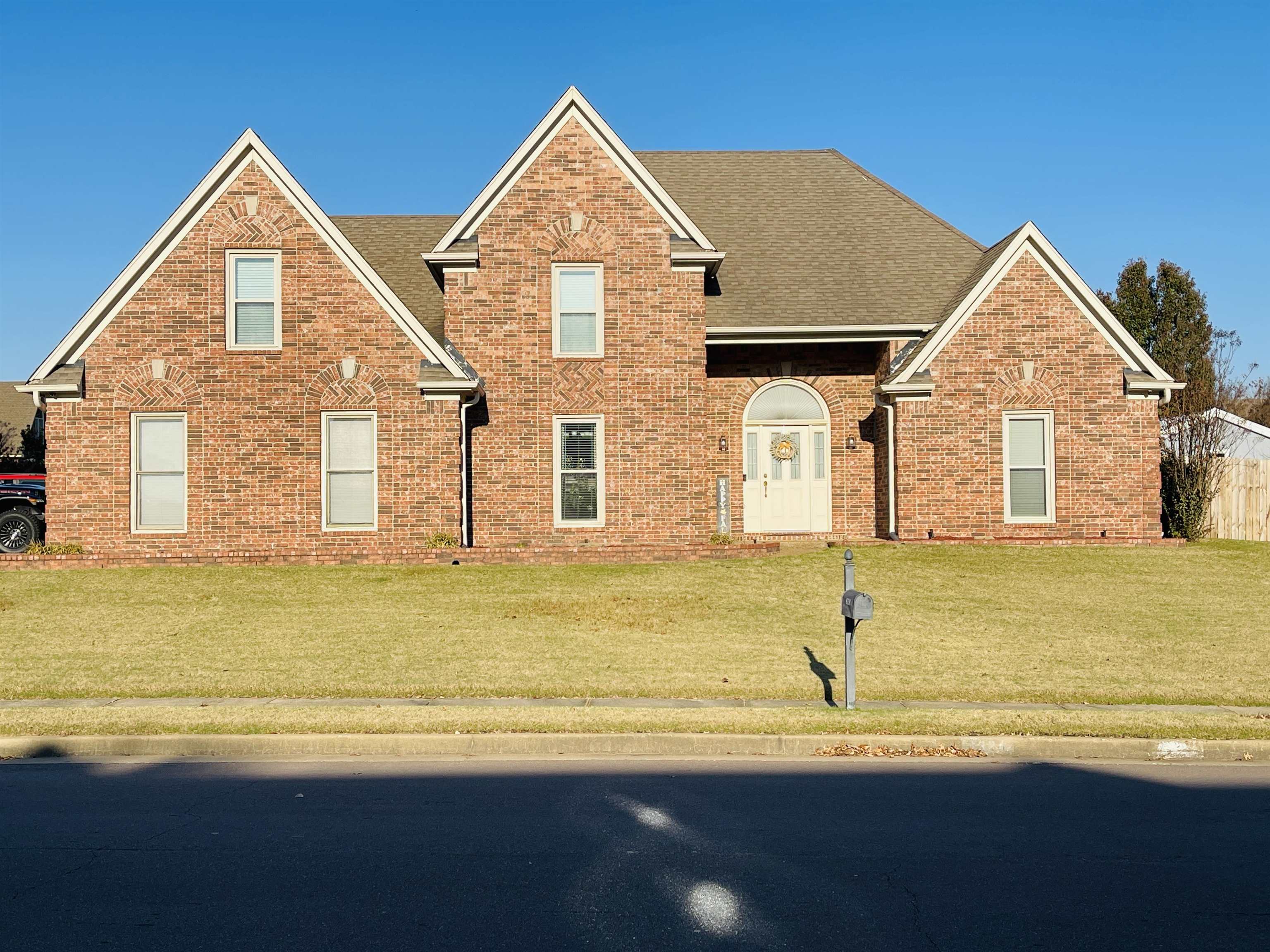 Front facade with a front lawn