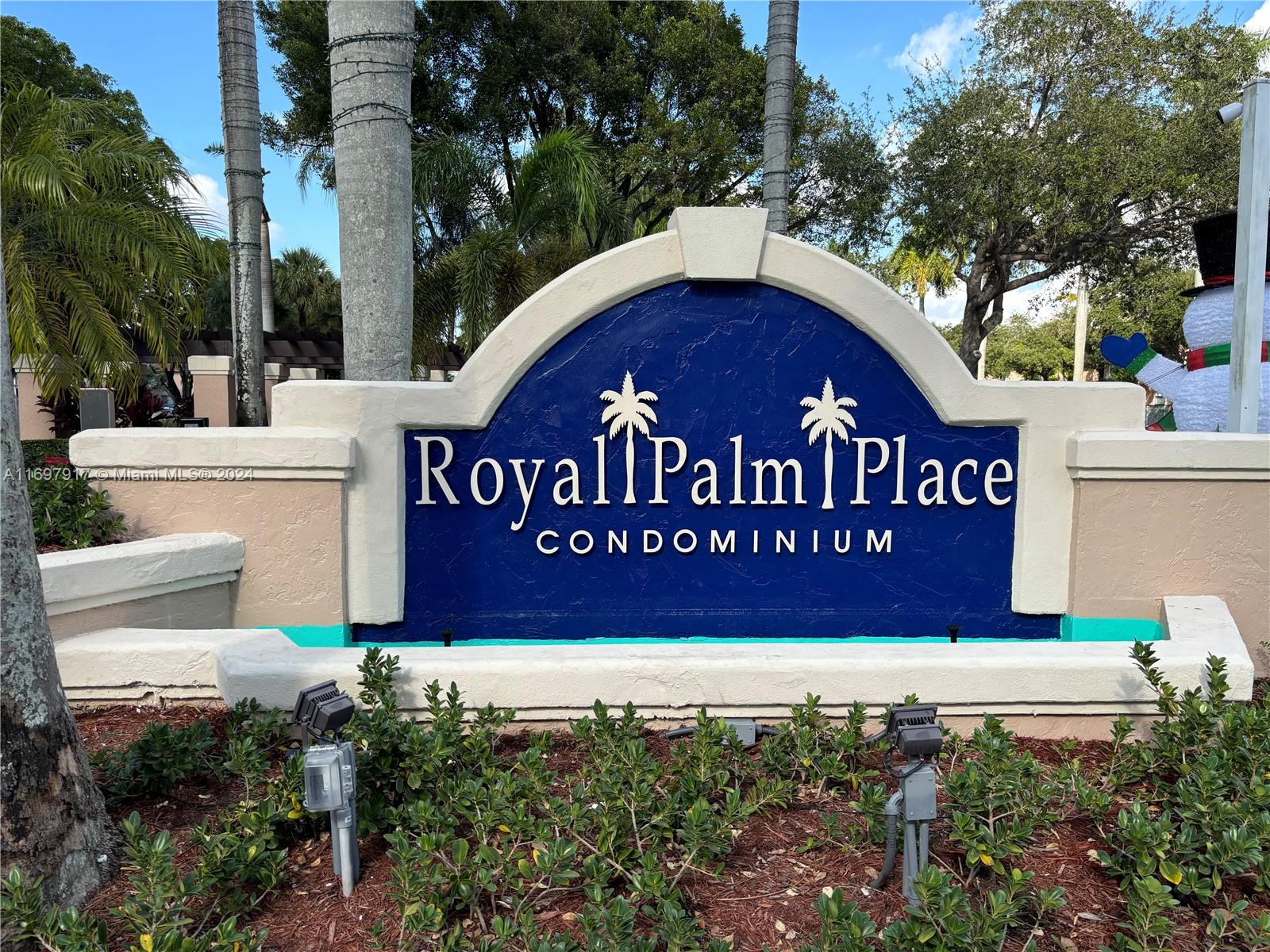 a view of outdoor space with signage and flags