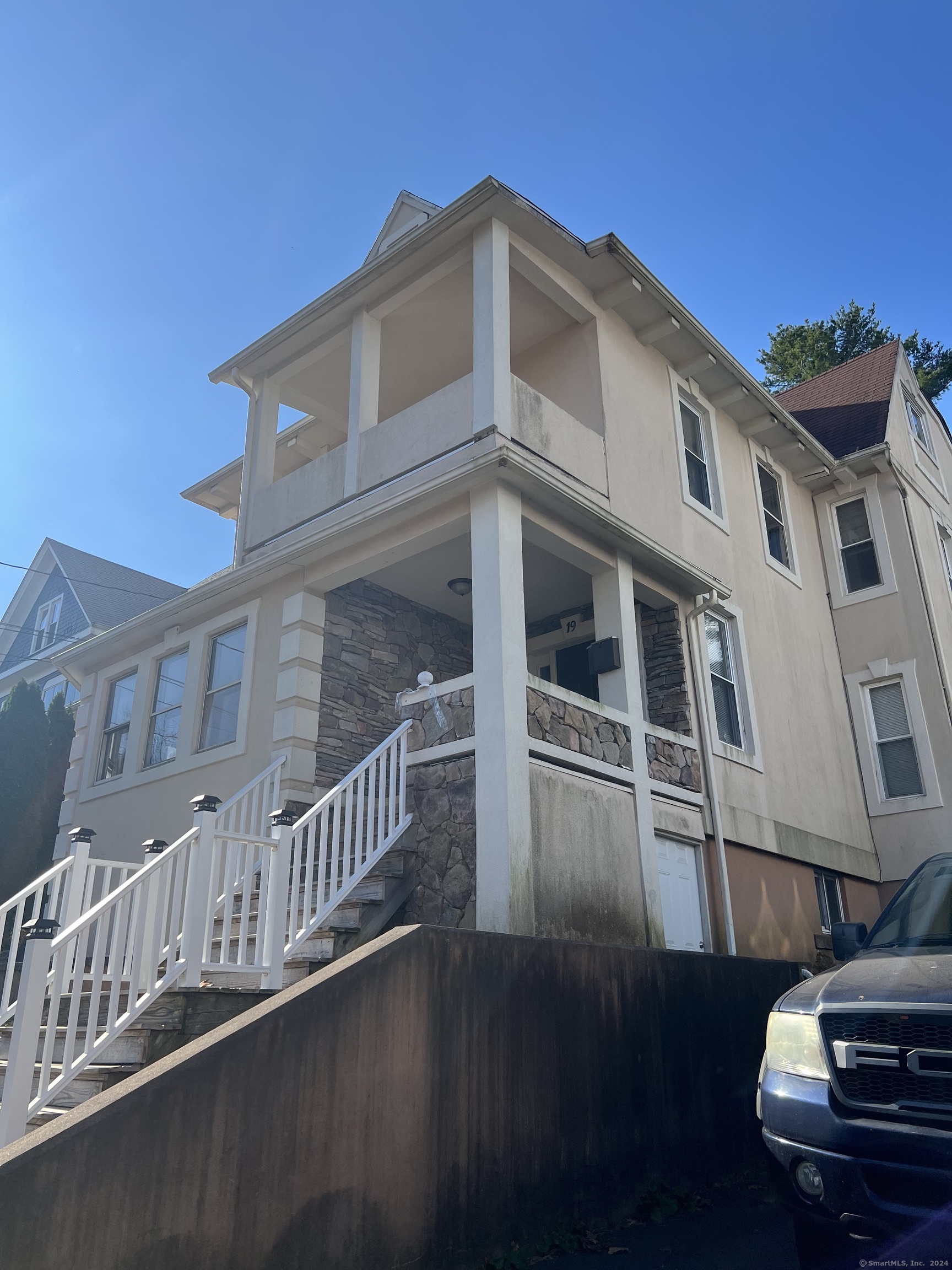 a view of a house with a deck