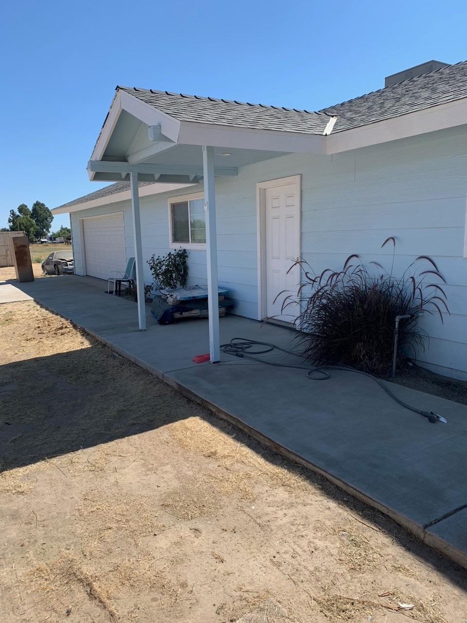 a view of a house with a patio