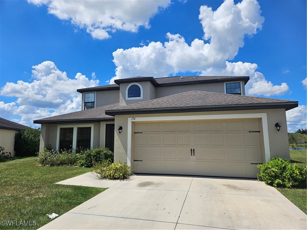 a front view of house with yard