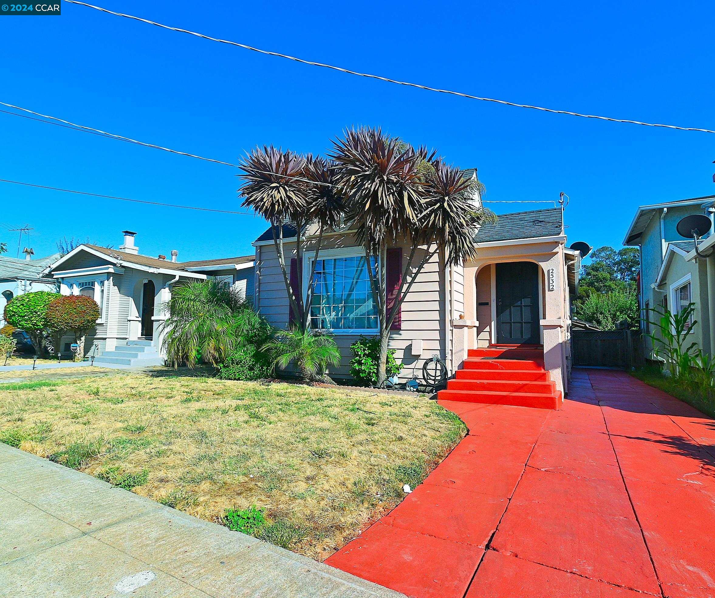 a front view of a house with yard